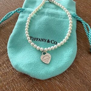 Tiffany & Co. White Pearl bracelet with Silver Heart Pendant